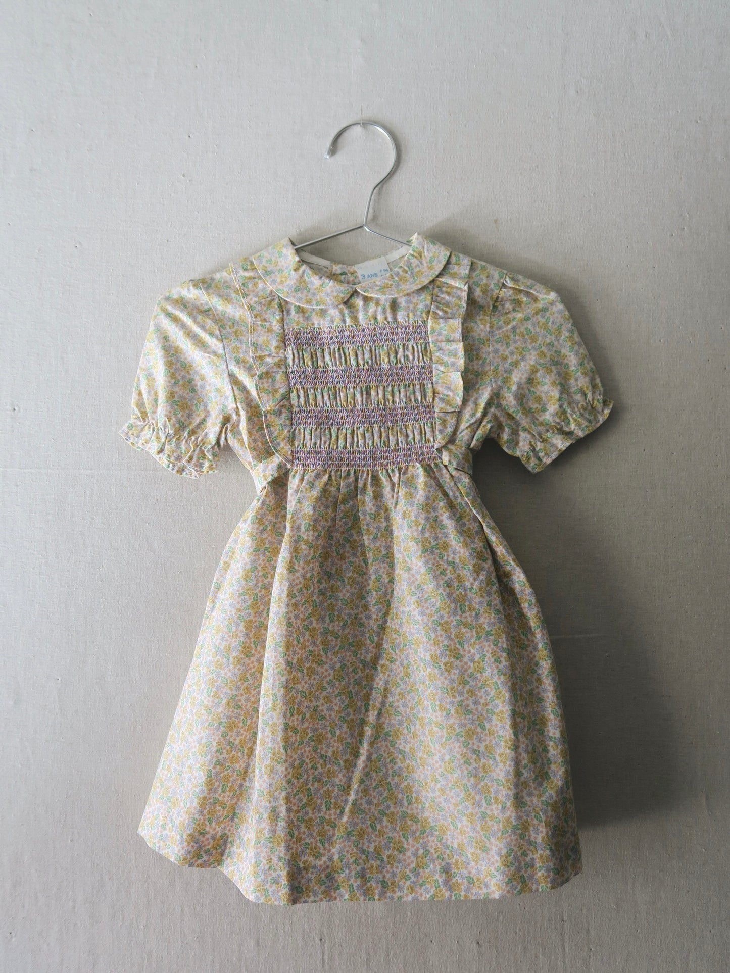 Poppel Pre-loved - Blomstret kjole m. smock - str. 3 år