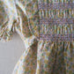 Poppel Pre-loved - Blomstret kjole m. smock - str. 3 år